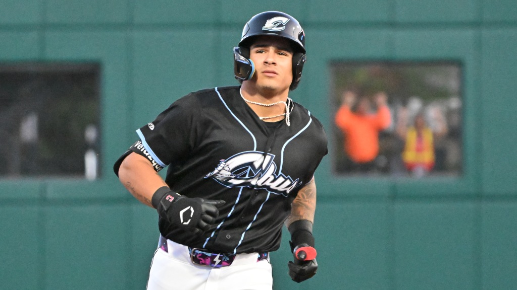 Ralphy Velazquez rounds the bases during one of his three home run trots on Saturday night