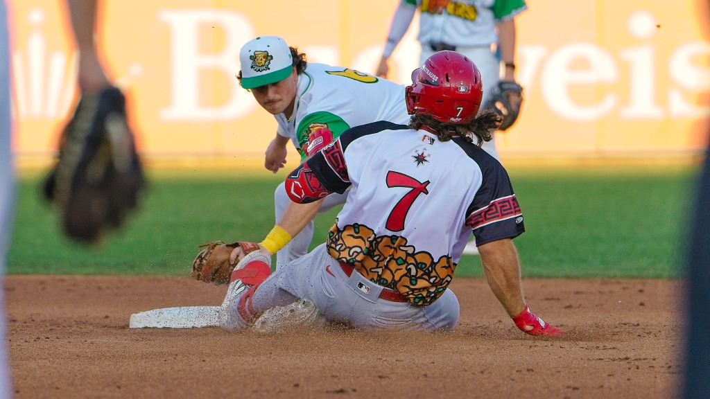 Dakota Harris is tagged out by Tulsa second baseman Jake Gelof trying to stretch a base hit into a double during Saturday's game at ONEOK Field.