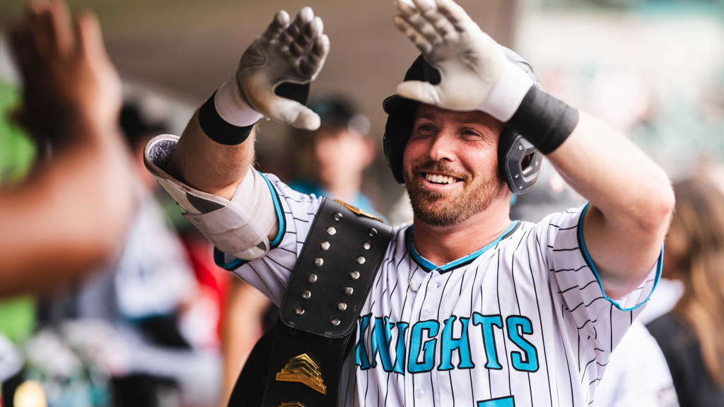 Riley Unroe celebrates in the dugout after clubbing a two-run homer in Charlotte's 10-1 win over Buffalo on Sunday.