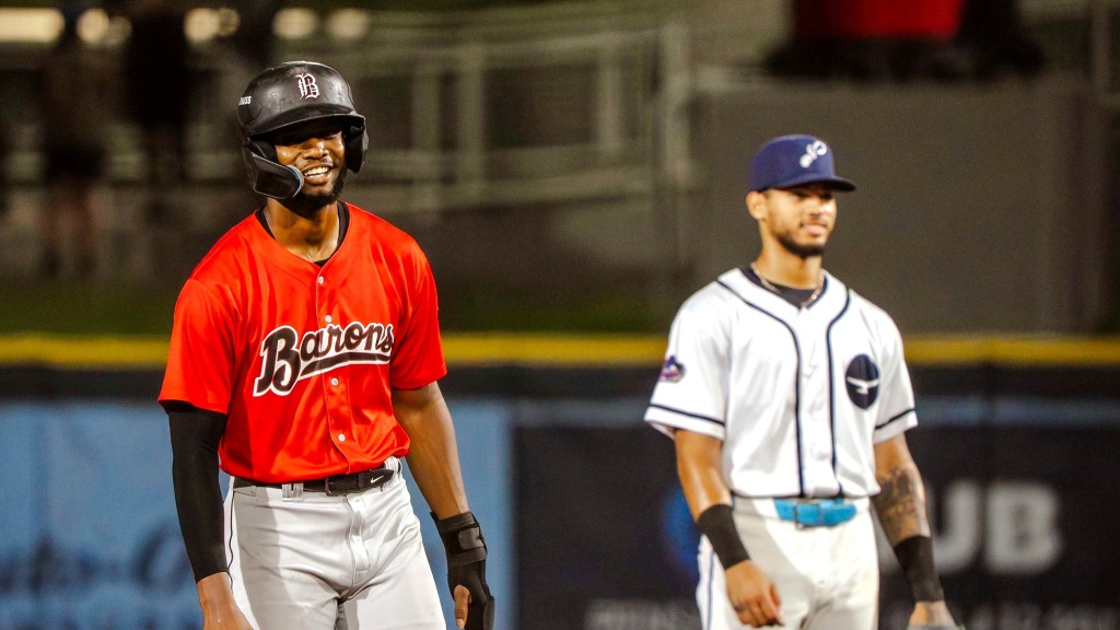 Former Pensacola Catholic star TJ McCants, now with Birmingham Barons, reacts after hitting a double in the June 19 game at Blue Wahoos Stadium.
