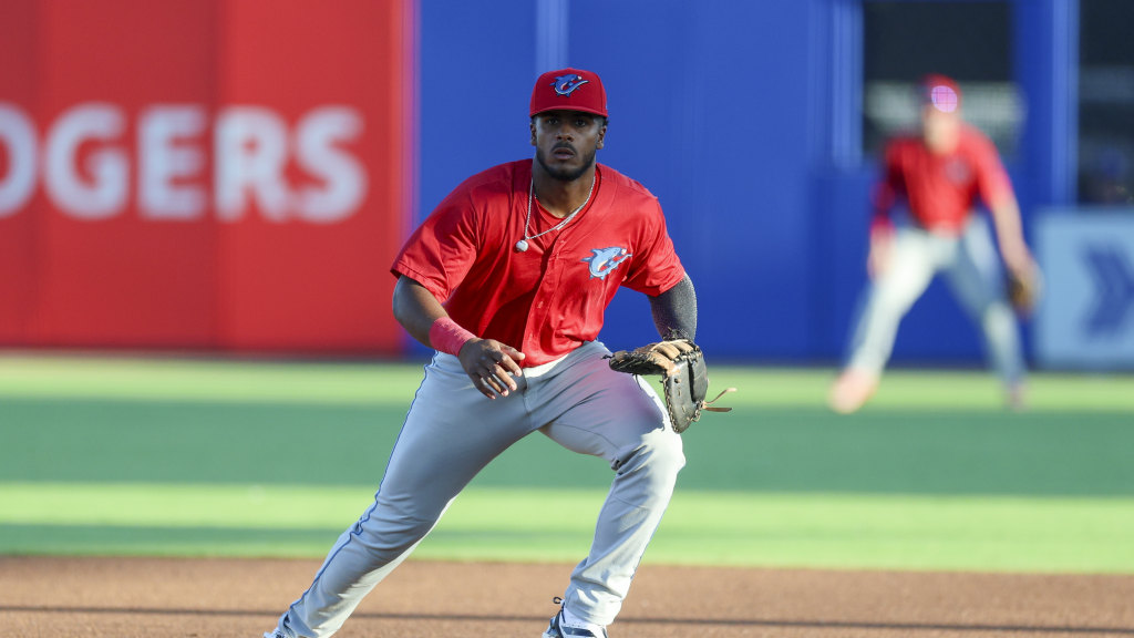 Phillies catching prospect Guillermo Rosario waits on a play in the field at first for the Clearwater Threshers.