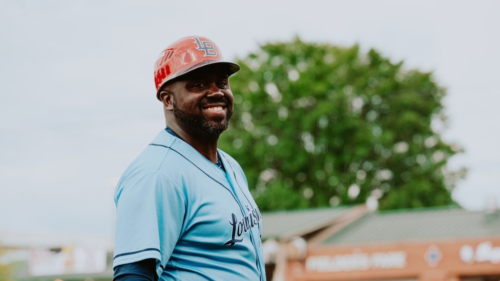 Vince Harrison can usually be found with a smile on his face in the third base coaching box.