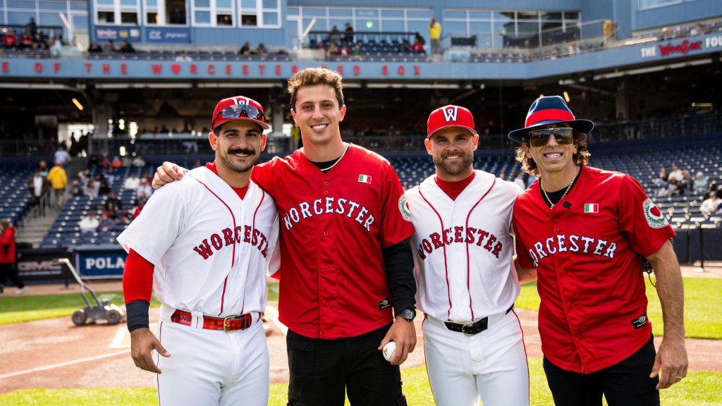 New England Patriots quarterback Tommy DeVito and his agent Sean Stellato (far right) threw out ceremonial first pitches to fellow Italian natives and WooSox players Mickey Gasper (far left) and Vinny Capra on Italian Heritage Day at Polar Park on Saturday.