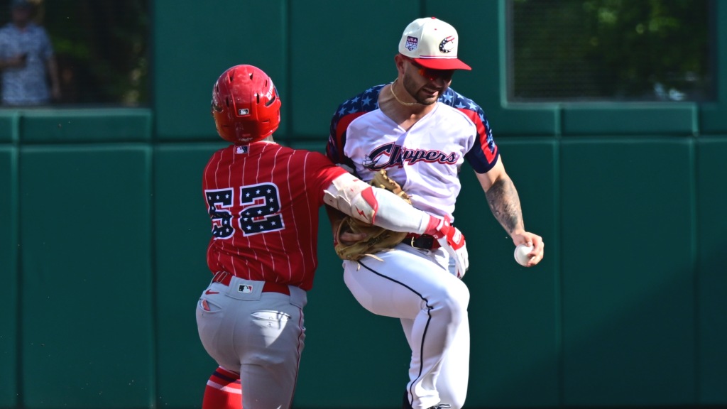 C.J. Kayfus had to hurry to retire Louisville's Carlos Jorge at first base Friday