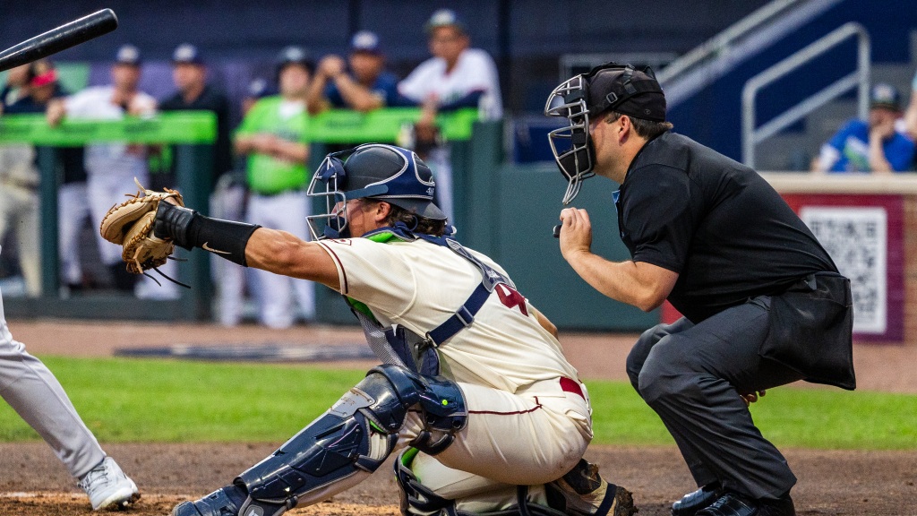Ben Hartl receives a pitch at Fifth Third Park.
