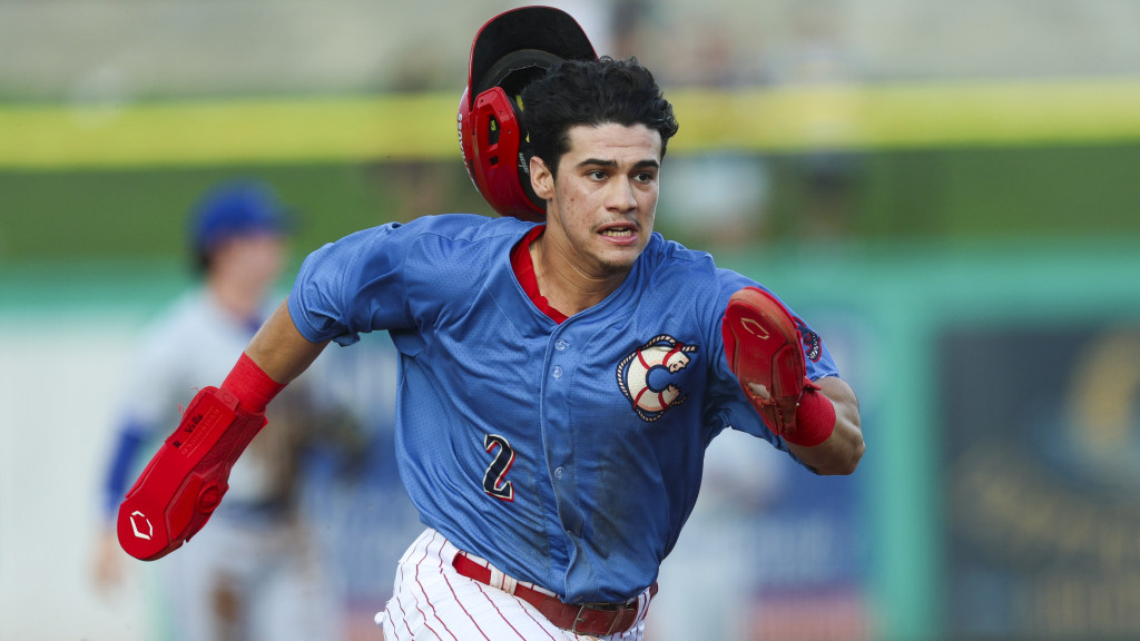 Phillies infield prospect Juan Villavicencio speeds around the bases during a game for the Clearwater Threshers.