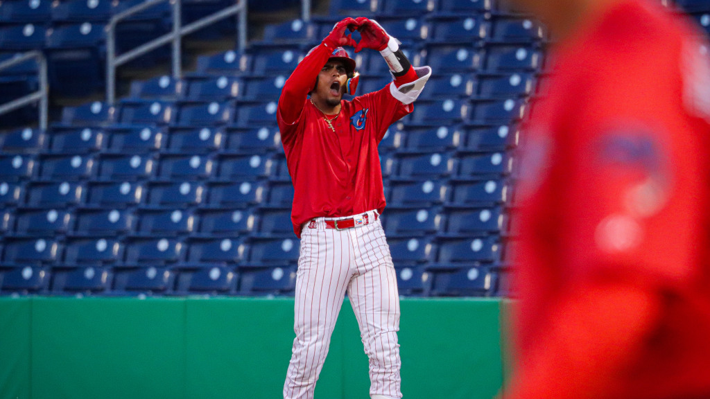 Top Phillies catching prospect Alirio Ferrebus celebrates after tying the game with an RBI single.