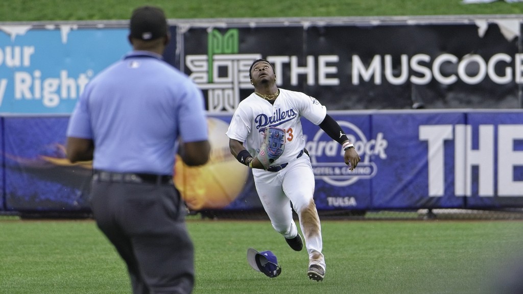 Zyhir Hope races to make a catch in Thursday's 5-1 win over Northwest Arkansas.