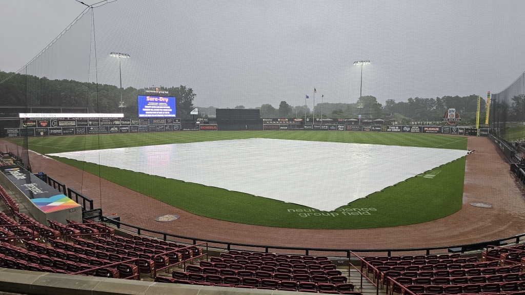 The tarp covers the infield at Neurosciece Group Field after the rainout of Thursday's doubleheader between the Wisconsin Timber Rattlers and Great Lakes Loons.