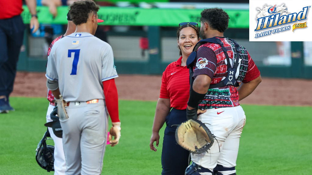 Springfield athletic trainer Kiomy Martinez-Ortiz checks on top prospect Rainiel Rodriguez during an injury timeout.