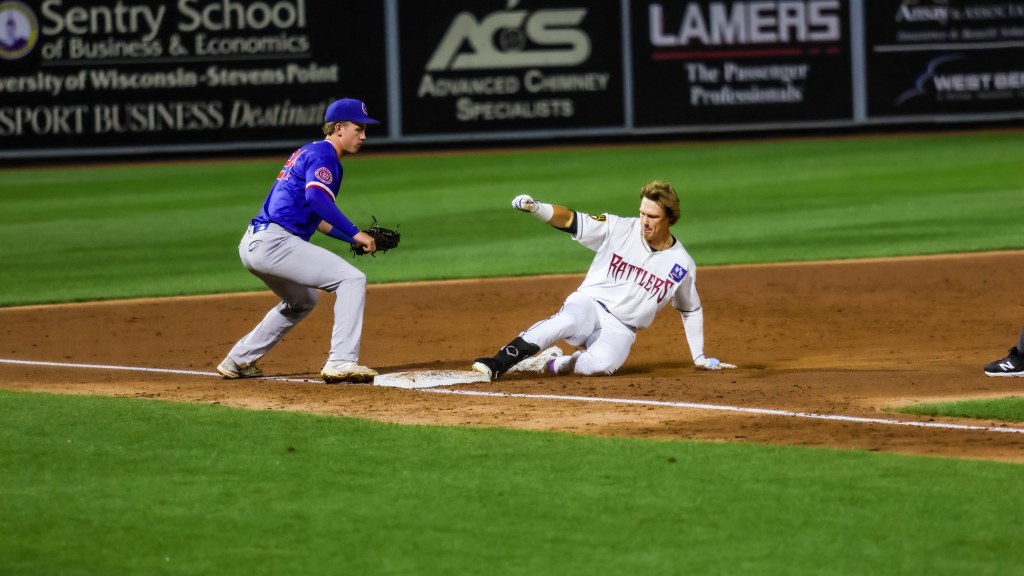 Sawyer Strosnider slides safely into third base on his two-run triple in the third inning against the South Bend Cubs on August 26, 2026.