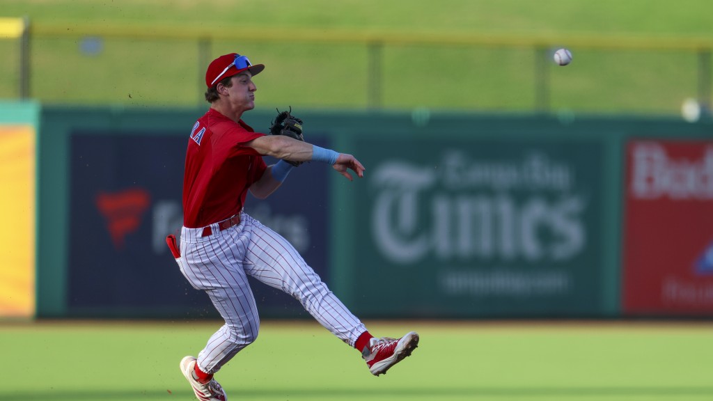 Phillies infield prospect Matthew Ferrara makes a throw to first for the Threshers