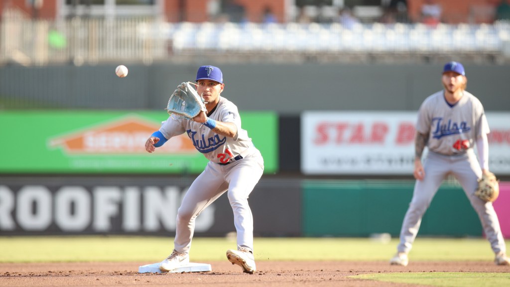 Jose Izarra takes a throw at second base during Tulsa's 5-3 win at Arkansas on Saturday night.