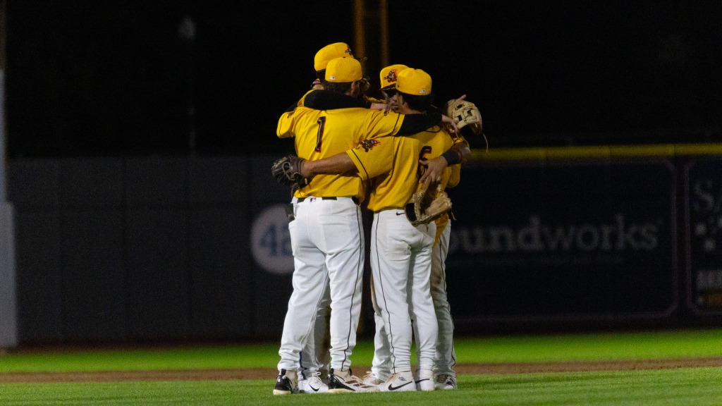 The RubberDucks infield celebrates after a 2-1 win.