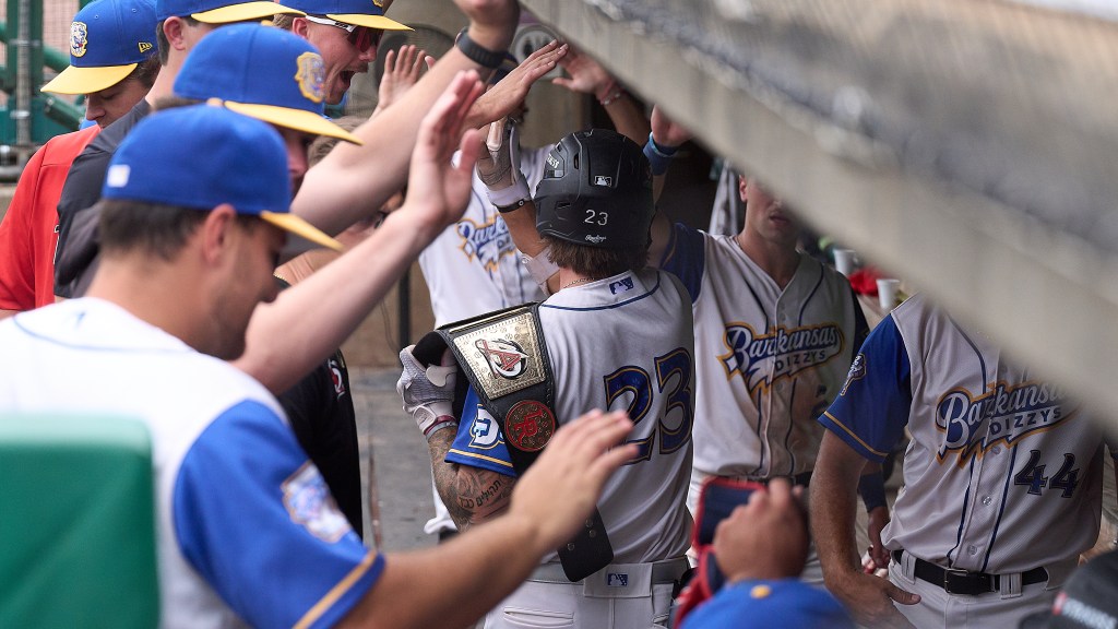 Hunter Fitz-Gerald was greeted in the dugout after his home run.