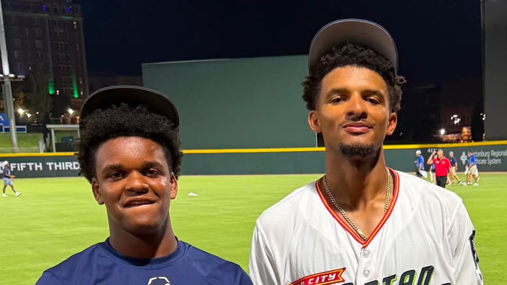 Chandler (right) and Chase Pollard after a Spartanburgers game. Credit: Pollard family.