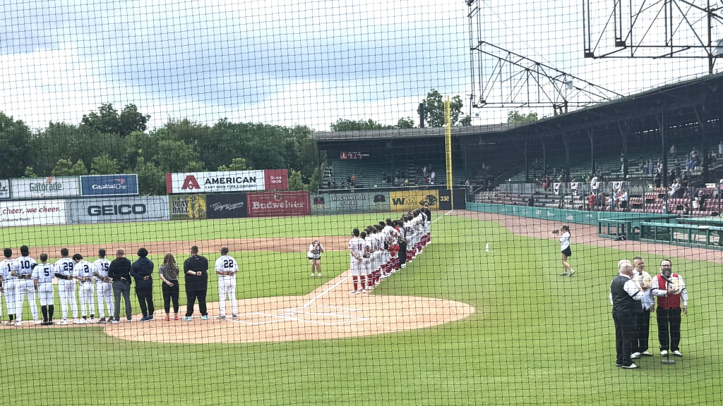The teams line up May 27 for the National Anthem at historic Rickwood Field in Birmingham at the annual Rickwood Game featuring the Blue Wahoos and Birmingham Barons