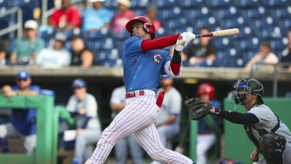 Phillies #21 prospect Alirio Ferrebus connects on a pitch during a win for the Threshers.