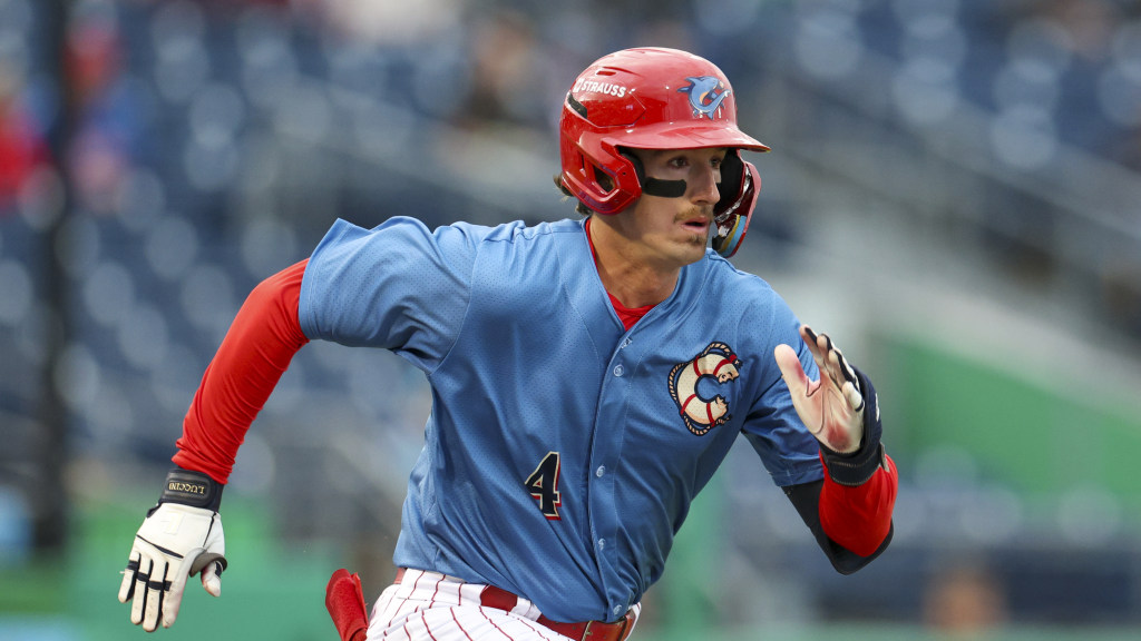 Phillies outfield prospect Jonathan Hogart runs out a hit in a game for the Clearwater Threshers.