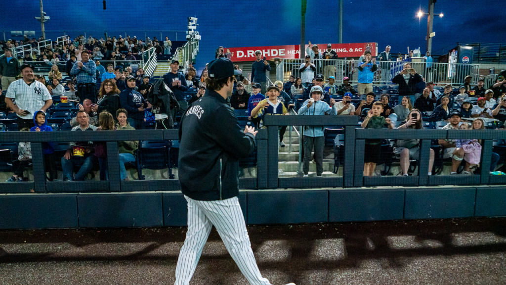 Gerrit Cole waves to fans as he exits for the clubhouse following his rehab start on April 23, 2026.