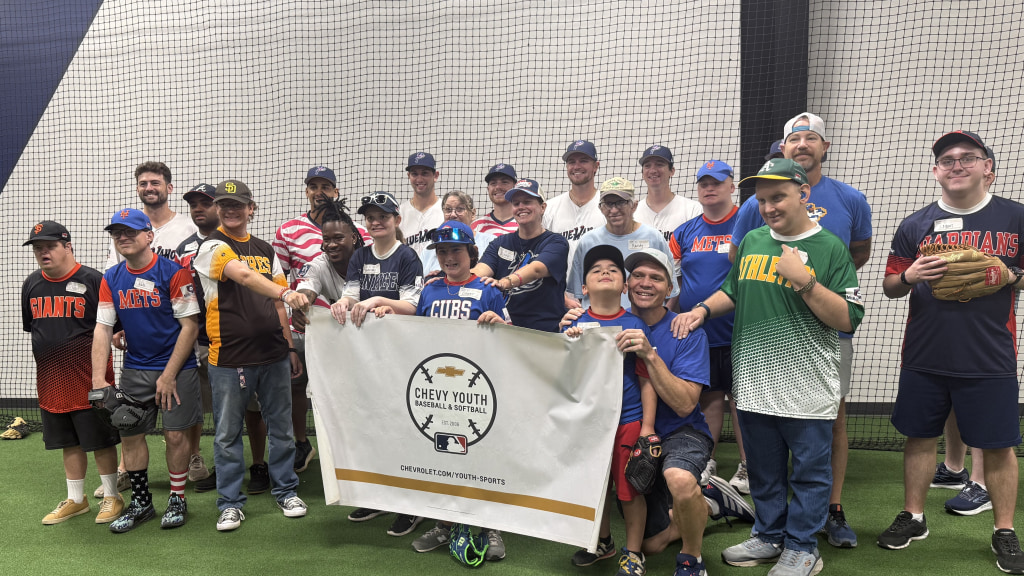 Blue Wahoos players join with members of Miracle League-Pensacola during Chevy Youth Baseball and Softball Clinic on July at Blue Wahoos Stadium. 