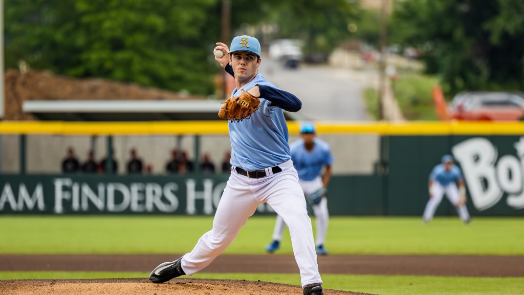 DJ McCarty pitches at Fifth Third Park.