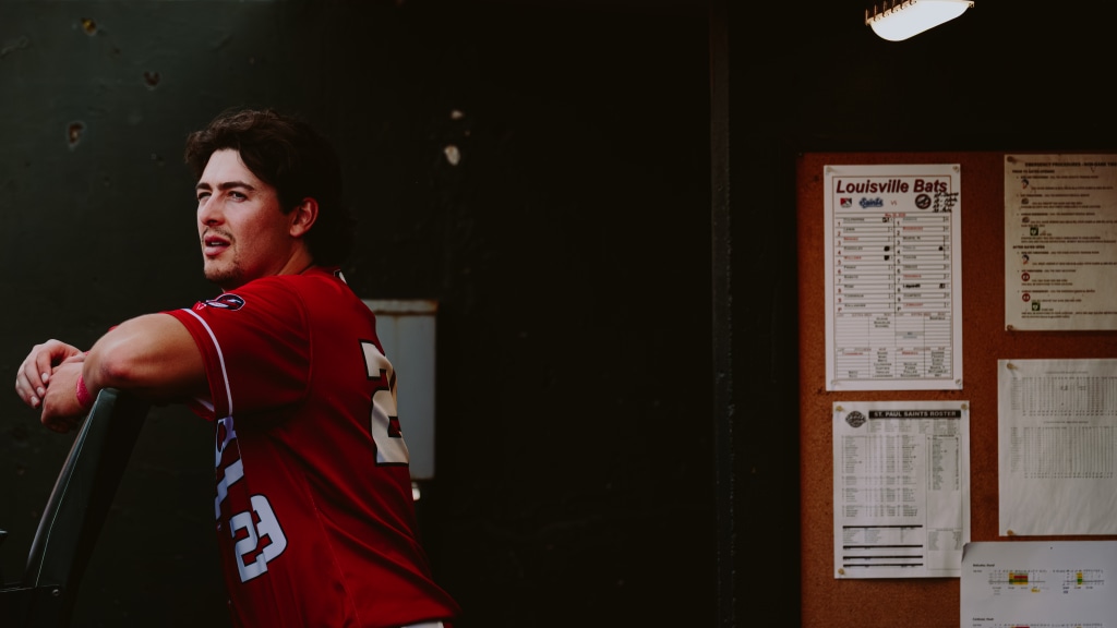 Michael Toglia takes a moment in the Bats dugout before play.