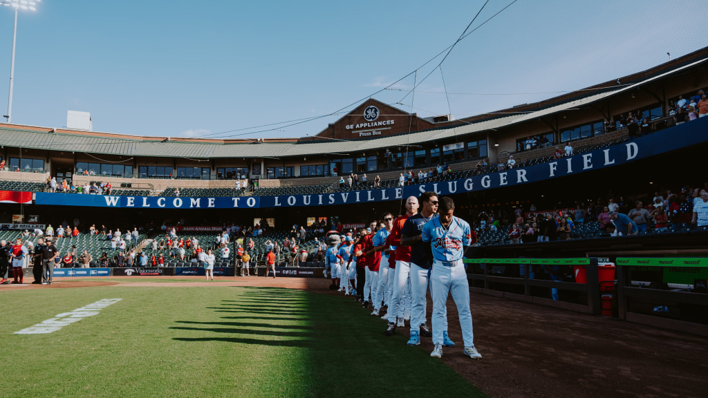 The Bats line up for the national anthem against Indianapolis.