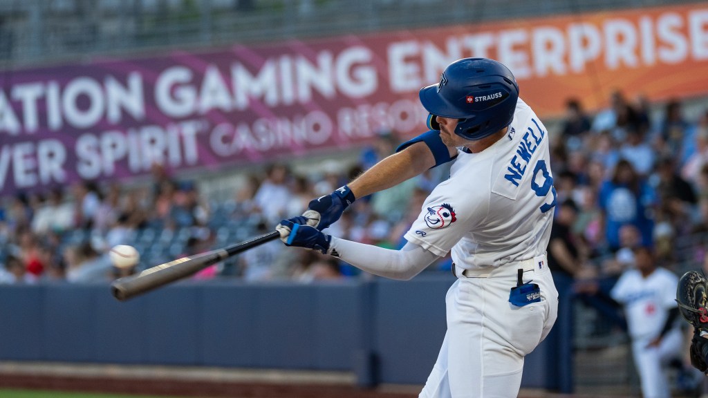 Chris Newell drove in four runs and extended his hitting streak to six straight games in Tuesday's victory.