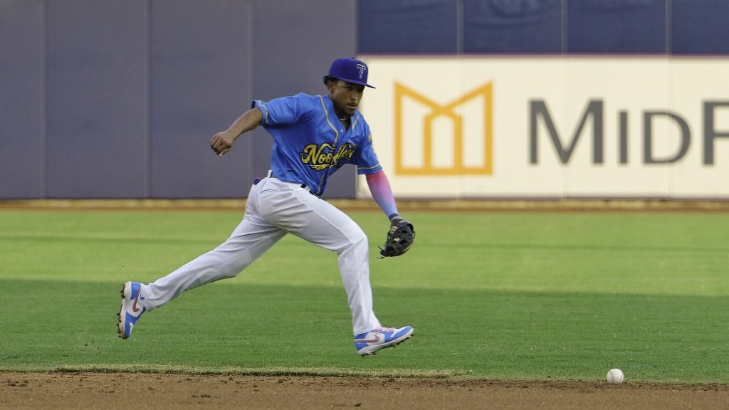 Newcomer Reyli Mariano ranges to his left to field a ground ball in Tulsa's 10-4 loss Saturday night at ONEOK Field.