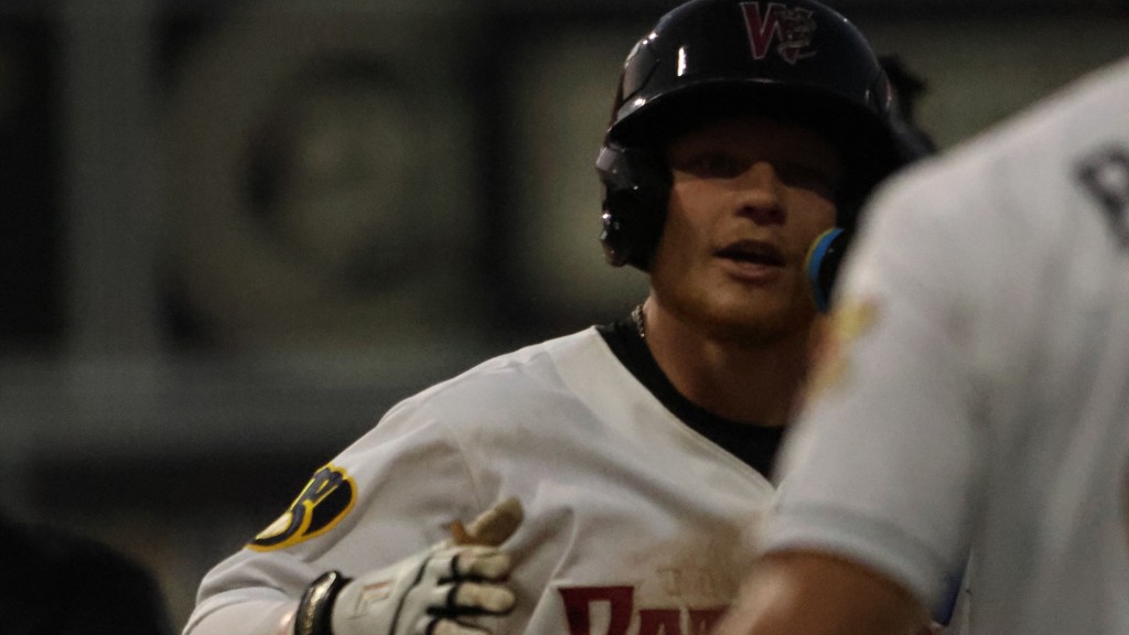 Daniel Dickinson is congratulated on his solo homer in the seventh inning against the Beloit Sky Carp on Saturday night.