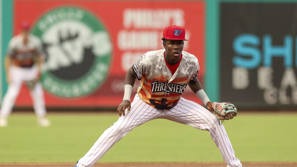 Phillies #22 prospect Romeli Espinosa gets ready for a play at third base in his home debut for the Clearwater Threshers.