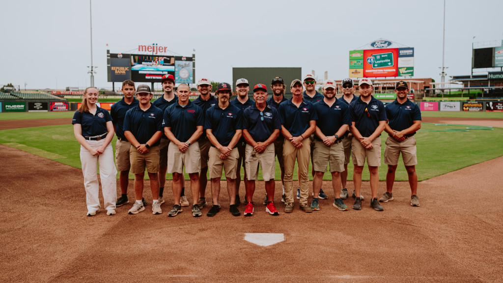 Shafer (center) has been the Bats' head groundskeeper since 2022.