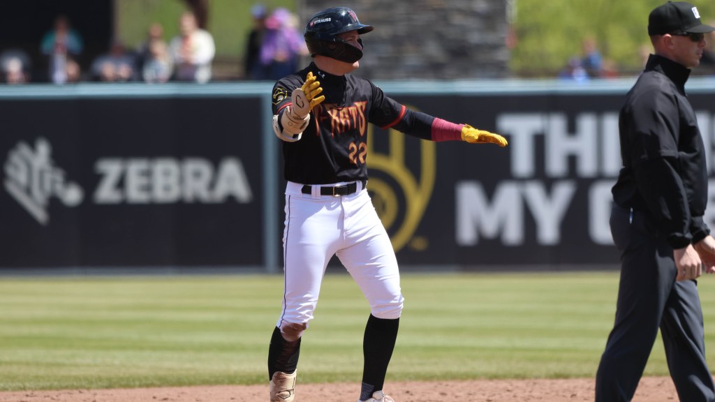 Tayden Hall celebrates a two-out, two-run double in the second innng on Wednesday afternoon. Hall had two doubles and four RBI in Wisconsin's 11-6 win over the South Bend Cubs.