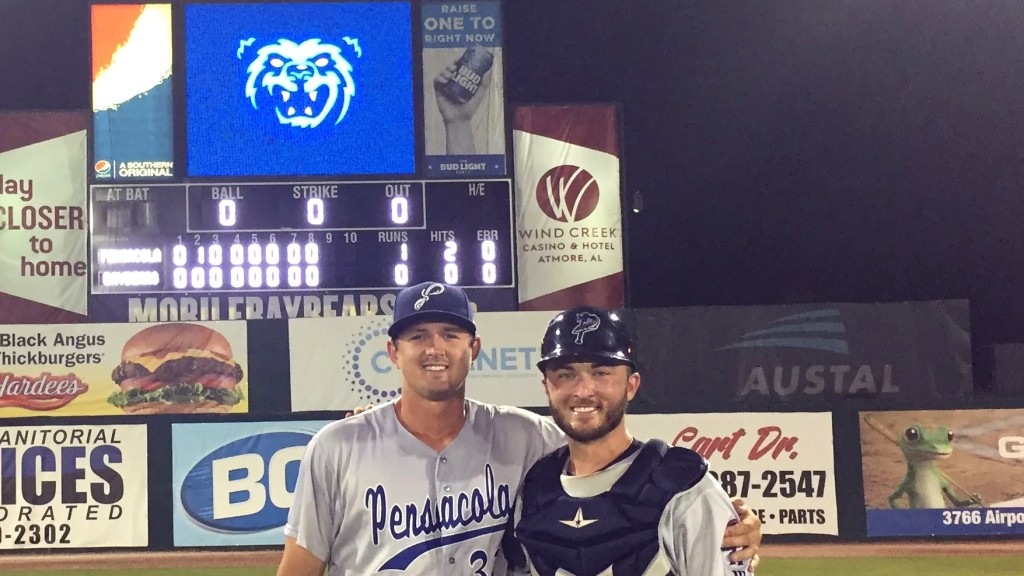 Former Blue Wahoos pitcher Tyler Mahle and catcher Joe Hudson after Mahle's historic perfect game in April 2017 at the former Hank Aaron Stadium in Mobile, against the Mobile BayBears.