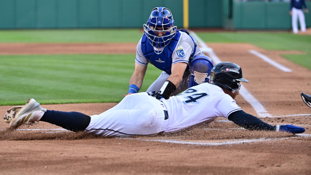 Juan Brito slides home just ahead of the tag to score the first Clippers run on Tuesday