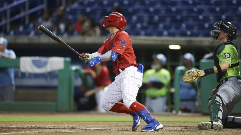 Phillies catching prospect Mark Kolozsvary smacks a double during a rehab assignment with the Clearwater Threshers.