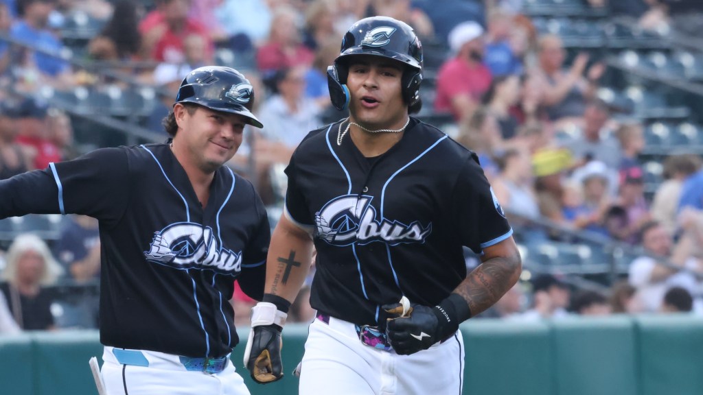 Ralphy Velazquez trots home after homering in the 1st inning Saturday