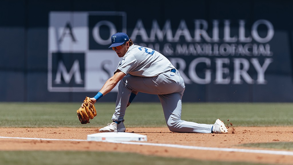 Third baseman Kyle Nevin makes a backhanded stop during Sunday's action in Amarillo.