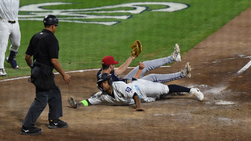 Yanquiel Fernández races home on a wild pitch to walk-off the game for the RailRiders.