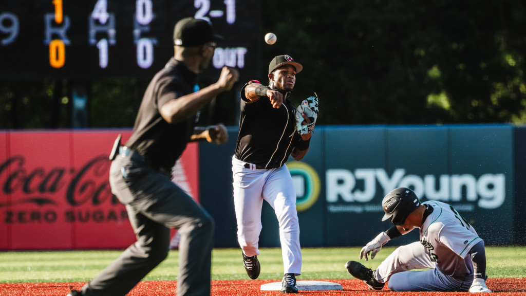 John Gil throws to first during a double play in a 3-0 loss to the Greensboro Grasshoppers on June 24th, 2026.