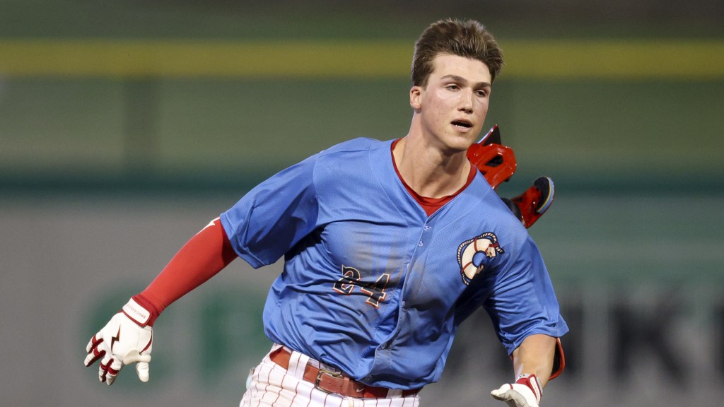 Phillies #13 Prospect Griffin Burkholder runs out a triple for the Threshers at BayCare Ballpark