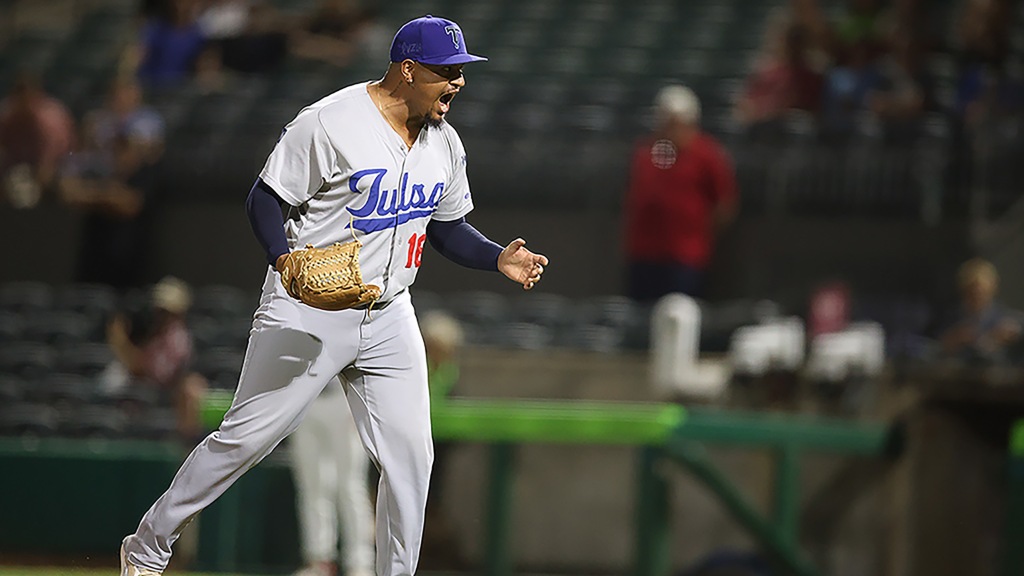 Christian Suarez reacts after Tulsa wrapped up a 5-3 win at Arkansas on Saturday. Suarez picked up his first save of the season in the victory.