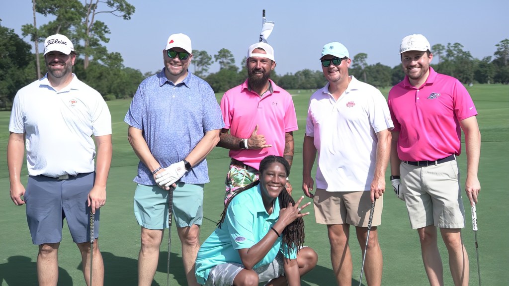 Blue Wahoos broadcaster Erik Bremer, right, teamed up with WNBA All-Star Michelle Snow, bottom, at Monday's tournament.