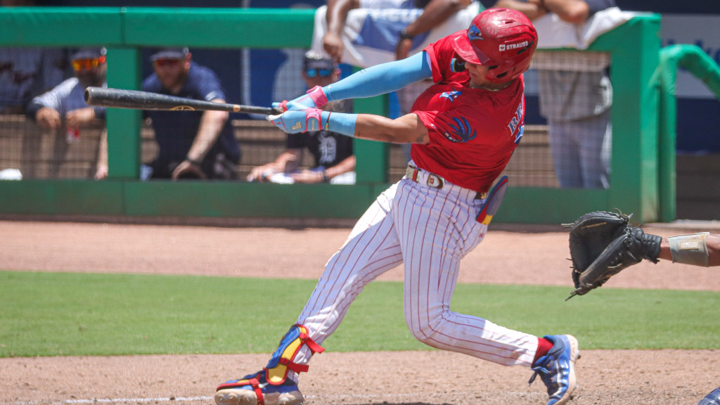 Phillies prospect Nolan Beltran connects for one of his two hits in a Threshers game at BayCare Ballpark.