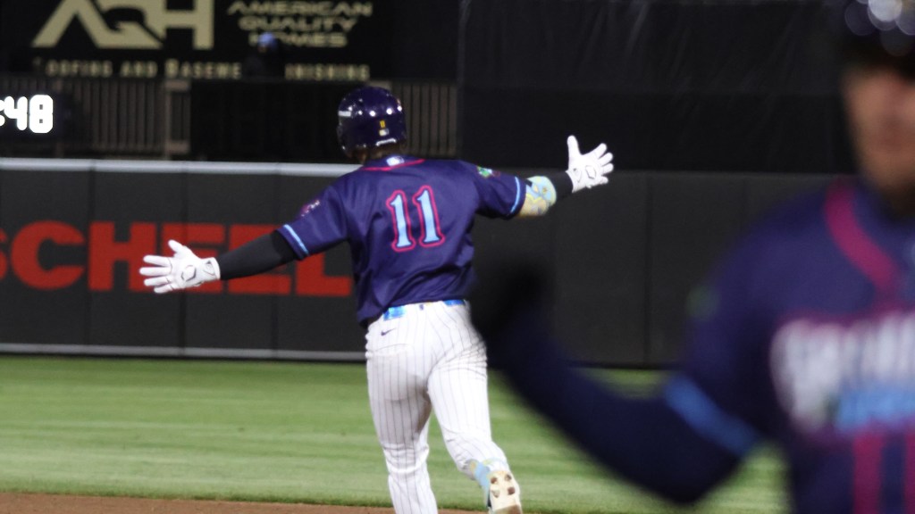 Andrew Fischer celebrates  as he rounds first after his tenth inning, walkoff homer to beat Quad Cities on May 1, 2026.