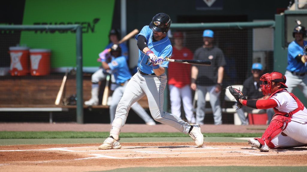Jacob Cozart takes a swing in Harrisburg Tuesday. His home run was part of Akron's decisive seven-run eighth inning.