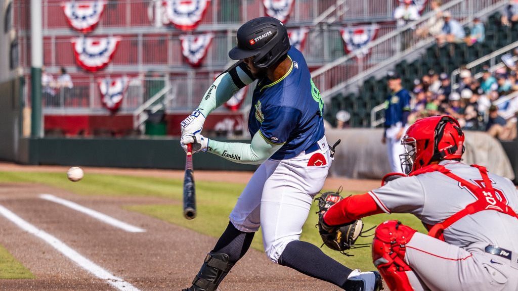 Gleider Figuereo takes a swing at Fifth Third Park.