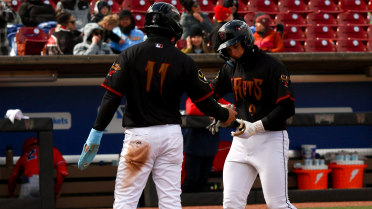 Wisconsin Rallies for Win in Ninth Inning