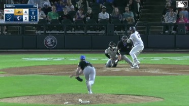 Manuel Palencia homers (7) on a fly ball to center field.